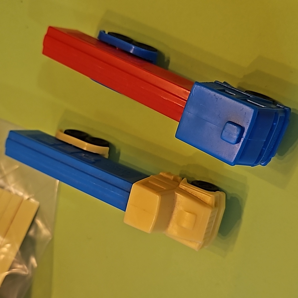 Set of 2 pre loved pez dispensers truck